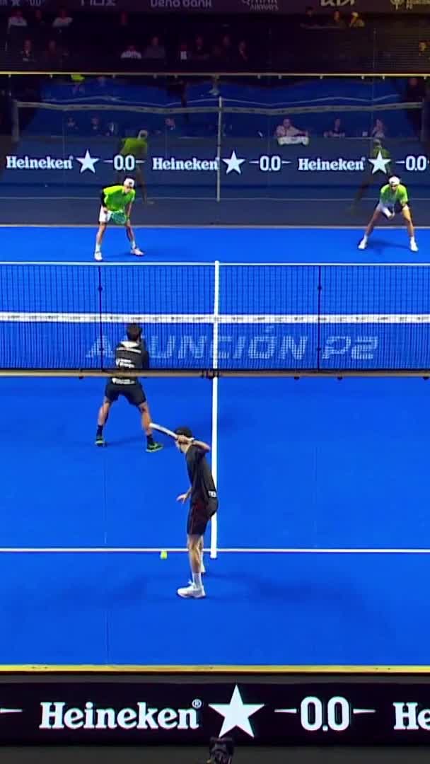 Rodriguez finishes the point with a powerful overhead smash