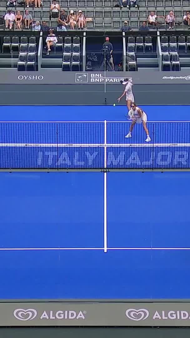 Triay puts away an overhead smash