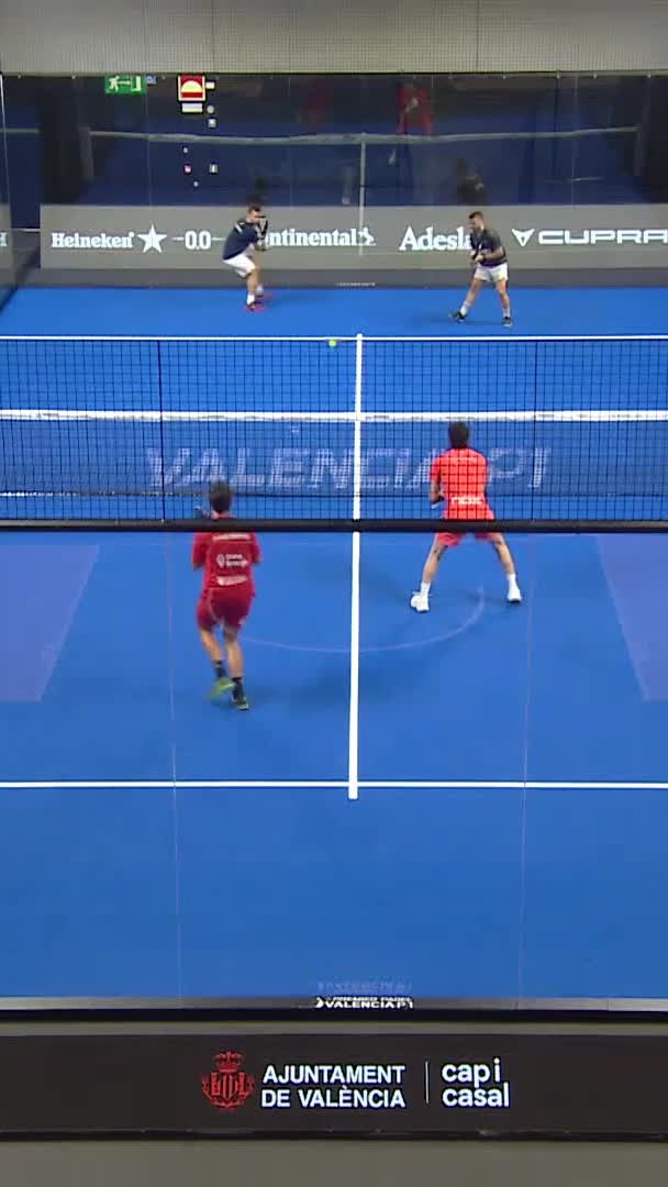 De Pascual hits a forehanded winner to take their fourth game of the first set